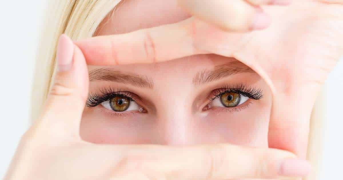 fingers framing face