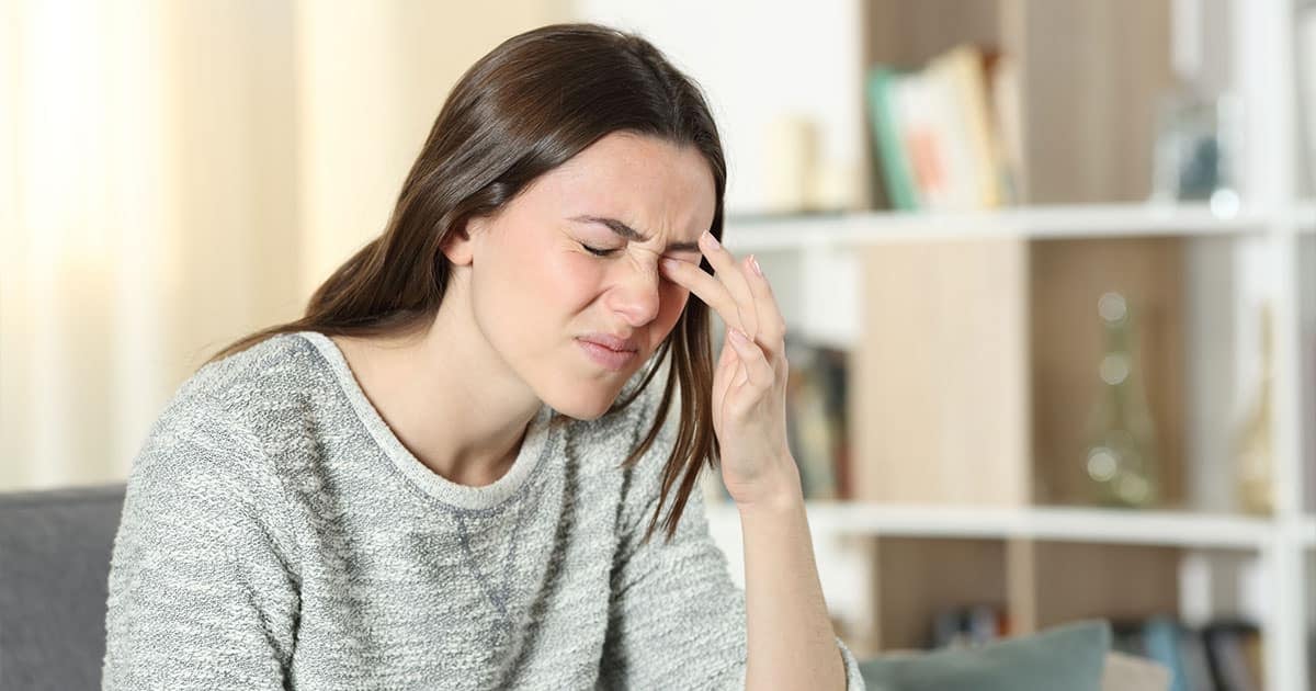Woman with eye allergies