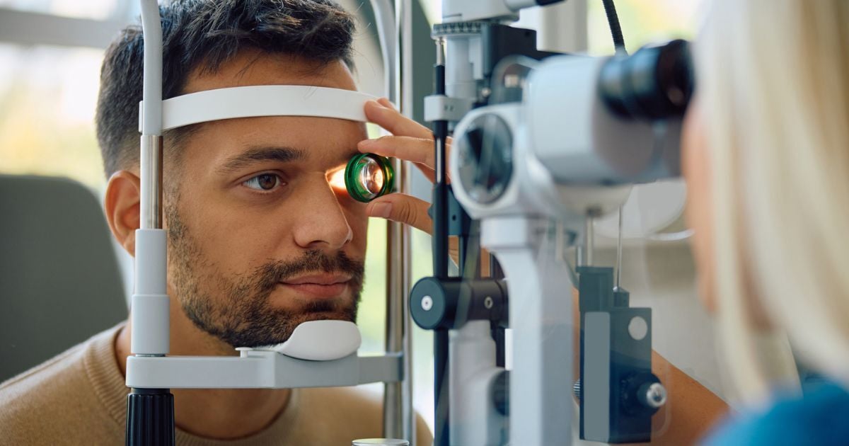 A man having his eye's examed for glaucoma.