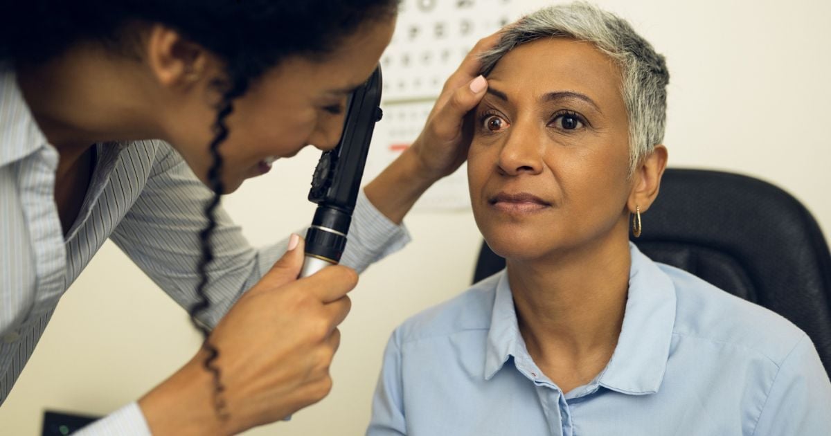 A woman having an eye exam to understand what type of dry eye she has.