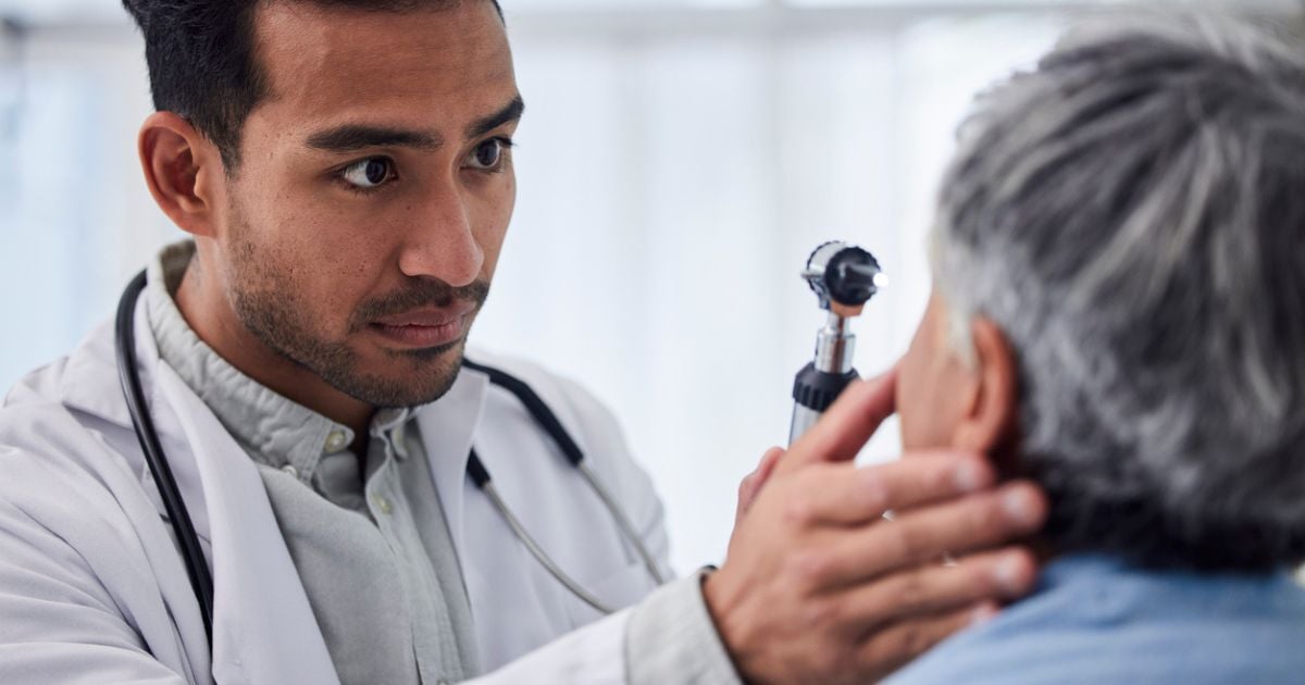 An eye doctor checking a patient's dry eye.