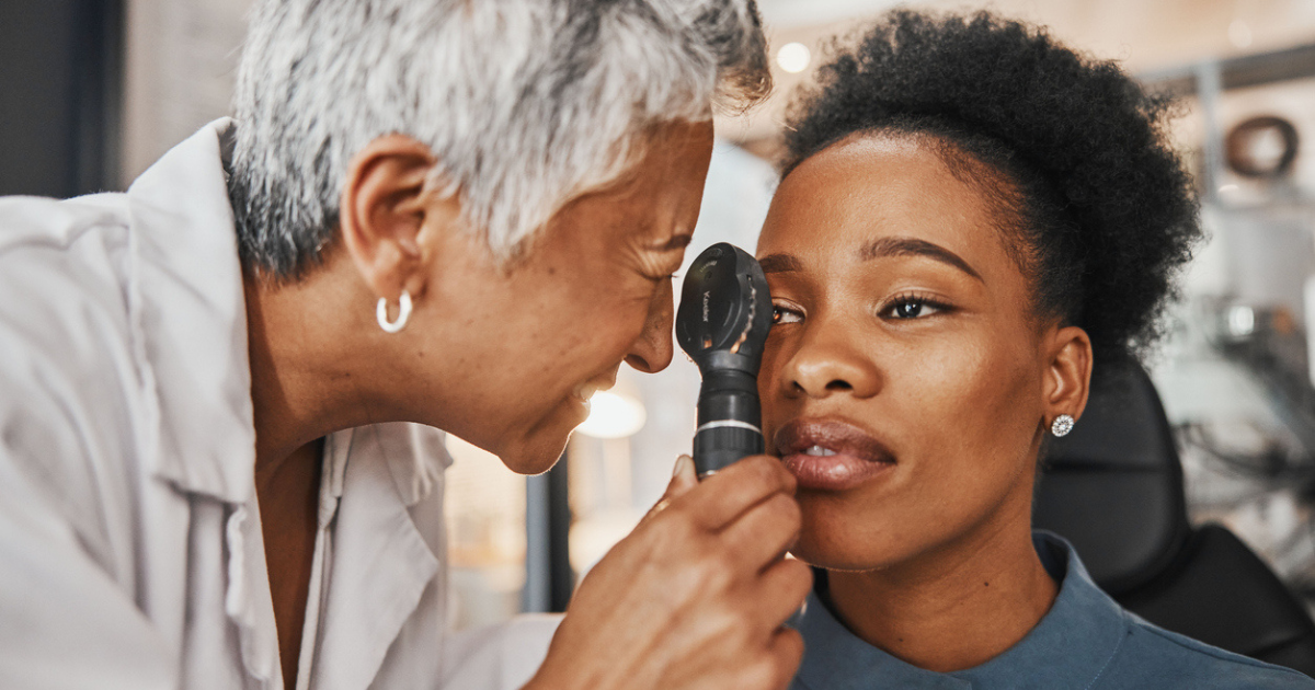 A woman having her eyes checked.