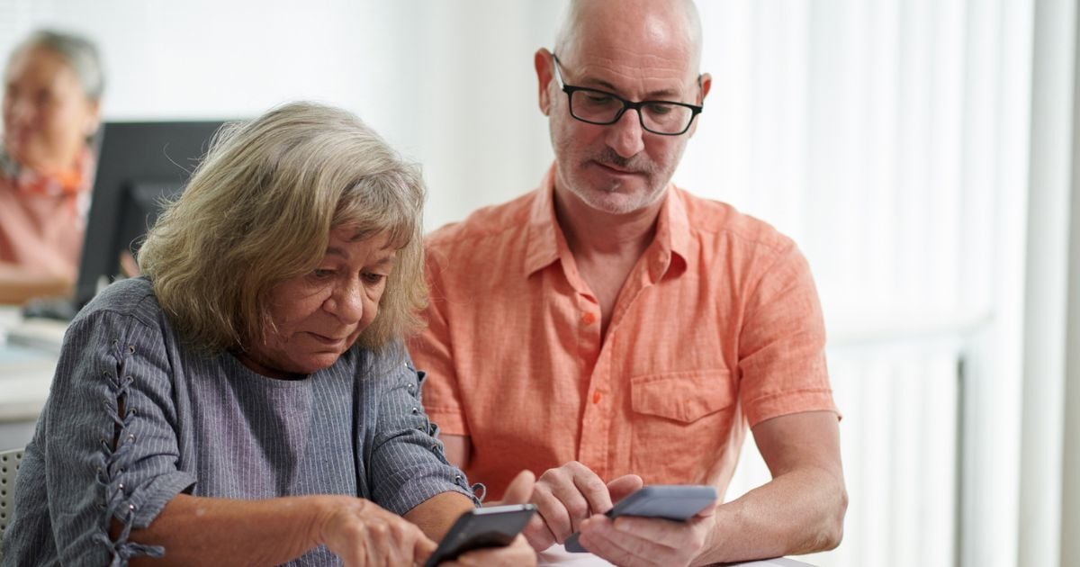 An older woman in low vision therapy to help with her vision changes.