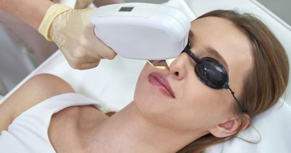 A woman receiving IPL treatment for dry eye.