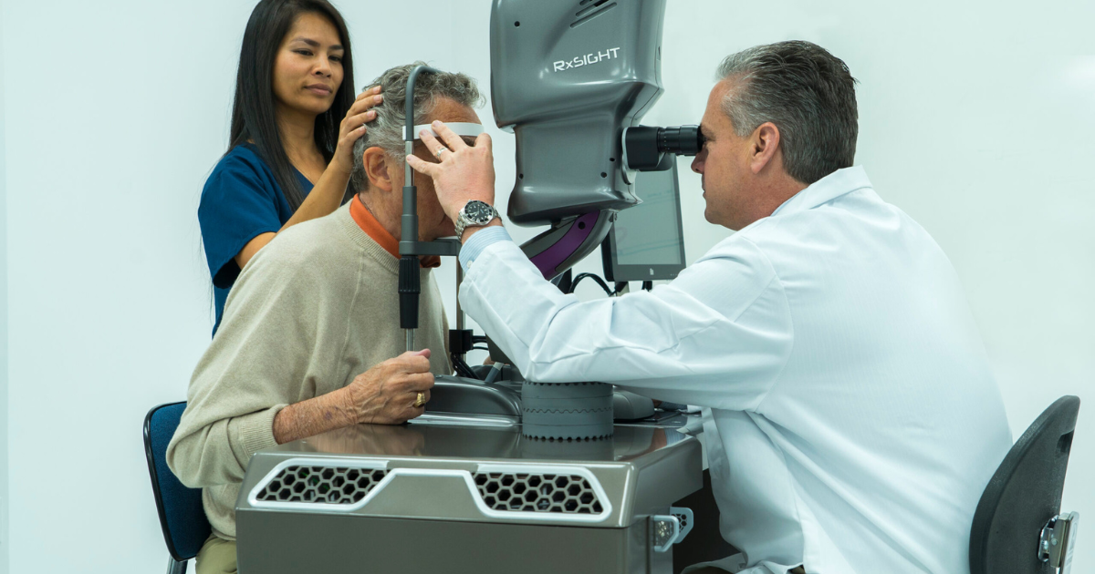 A man having his eye examined for a light adjustable lens procedure.
